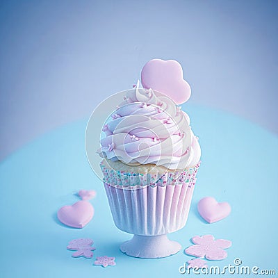Large sweet cupcake on a light background. Generative AI. Stock Photo