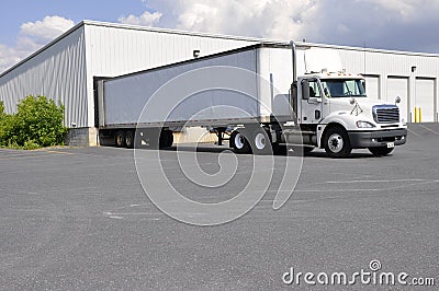 Large truck at unloading dock Stock Photo