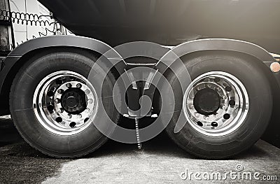 Large a truck wheels and tires of semi truck. Stock Photo