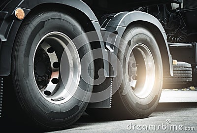 Large a truck wheels and tires of semi truck. Stock Photo