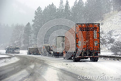 Large trucks fight a winter storm Editorial Stock Photo