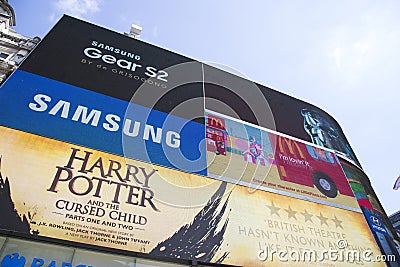 Large TV screen in piccadilly circus showing adverts Editorial Stock Photo