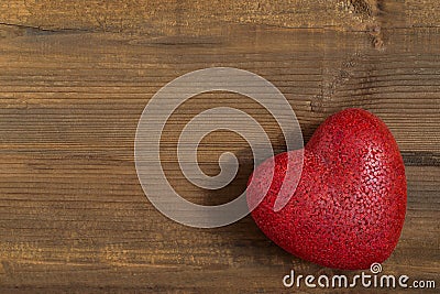 Large vintage heart on old wooden background Stock Photo