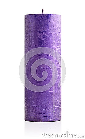 Large violet candle with a rough texture Stock Photo