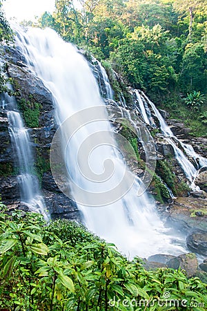Large waterfall in forest Stock Photo