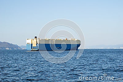 Roll-on roll-off RORO or ro-ro ships or oceangoing vehicle carrier ship anchor in the open sea Stock Photo