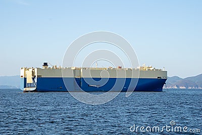 Roll-on/roll-off RORO or ro-ro ships or oceangoing vehicle carrier ship anchor in the open sea Stock Photo