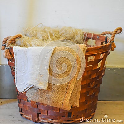 Large Wicker Basket with Burlap and Flax Stock Photo