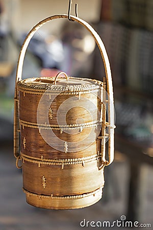 Large wicker jar made of wood as a household item in the market in the village. Cambodia Stock Photo