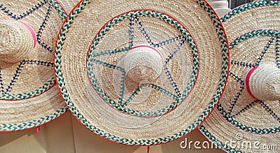 Large women straw hats elegant and colorful at market street walk during summer on sunny days Stock Photo