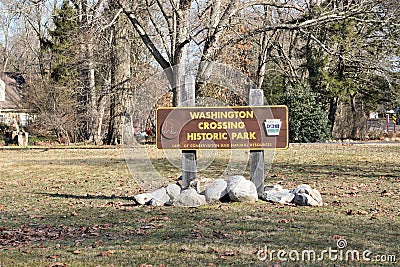 Washington Crossing Historic Park brown entrance sign on mown lawn Editorial Stock Photo