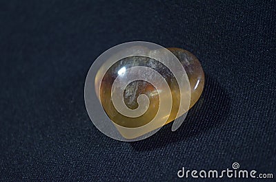 Fluorite heart crystal. Fluorite Gemstone Crystal Heart. Stock Photo