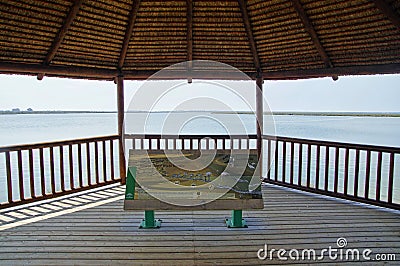 Information board with map of Las Marismas Del Odiel - Andalucia, Spain Editorial Stock Photo