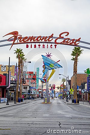 Fremont East district entrance sign with neon sculptures in early morning light Editorial Stock Photo