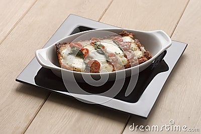 Lasagna with tomatoes Stock Photo
