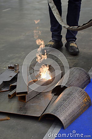 Laser cleaning of metal. Industrial removal rust metal surface with laser beam Stock Photo