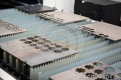 Laser cutter cutting metal plates Stock Photo