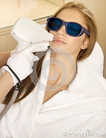 Laser hair removal in professional studio. Stock Photo