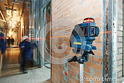 Laser level measurement at construction site Stock Photo