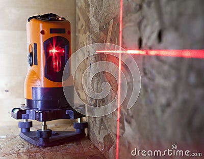 Laser measurement level for construction works, small depth of sharpness Stock Photo