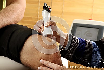 Laser physiotherapy Stock Photo