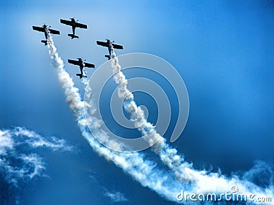 Last flight of four piston propeller aerobatic aicraft. Editorial Stock Photo