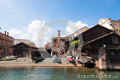 Last gondolas repairman. Venice landmark, Italy Editorial Stock Photo