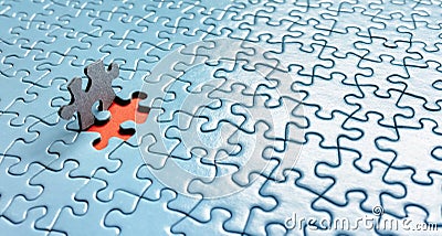 The last piece of jigsaw puzzle concept for solution and completion Stock Photo