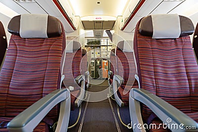 3 last Seat rows and Catering section in an airplane cabin. Stock Photo