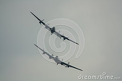 The last two remaining airworthy Avro Lancasters heavy bombers performing a duet in the skies Editorial Stock Photo