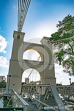 Lasting architecture of the historic suspension bridge over Waco`s Brazos River Stock Photo