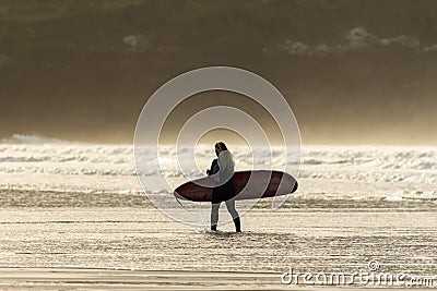 Late afternoon Surfing, Fistral beach, Newquay, Cornwall Editorial Stock Photo