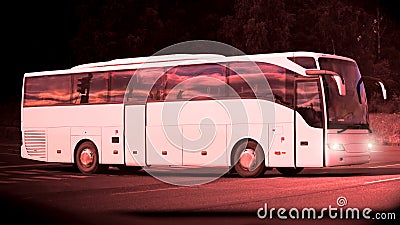 Late Evening Bus On the Road at Dusktime Stock Photo