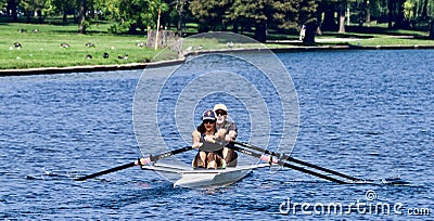 Co-ed Tandem Rower On Lincoln Park Lagoon #3 Editorial Stock Photo