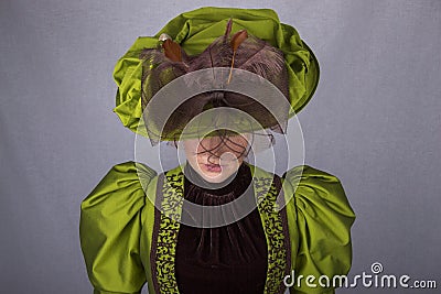 Late Victorian woman in green silk ensemble Stock Photo