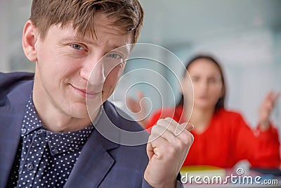 Latent aggression and conflict between male worker and his angry female business boss. Horizontal image Stock Photo