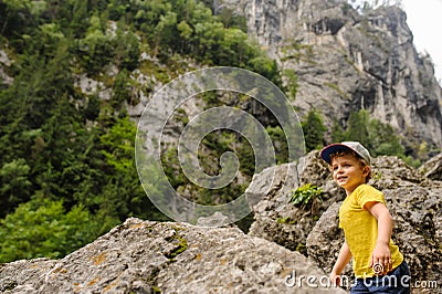 Lateral view of a 6-years blond boy Stock Photo