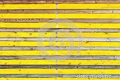 Lateral wooden planks with alternating yellow color and natural texture Stock Photo