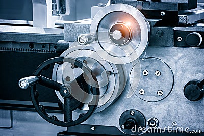 Lathe control knobs close up. Metal machine tools industry. The metalworking process by turning machine Stock Photo