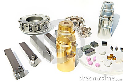 Lathe, milling cutters and machine chucks on white isolated Stock Photo