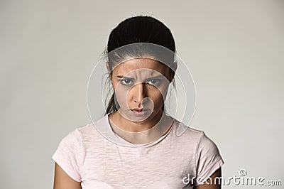 Latin angry and upset woman looking furious and crazy moody in intense anger emotion Stock Photo