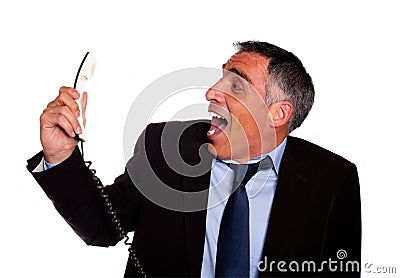 Latin business man laughing with a phone Stock Photo