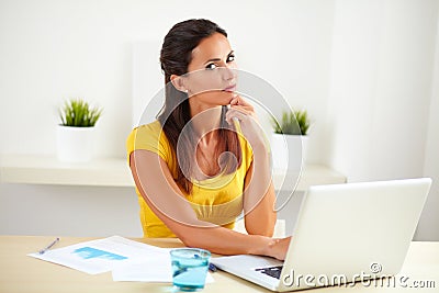 Latin lady working in a corporate company Stock Photo