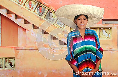 Latin mexican hispanic sombrero poncho woman Stock Photo