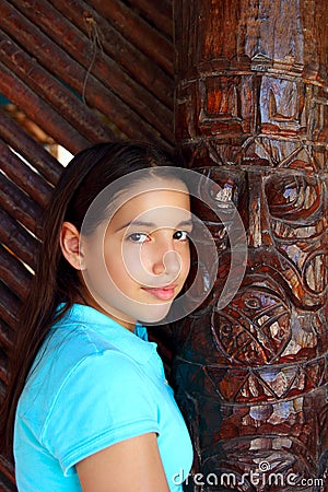http://thumbs.dreamstime.com/x/latin-mexican-teen-girl-smile-indian-wood-totem-18383347.jpg
