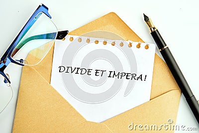 Latin quote Divide et impera meaning Divide and conquer. the best method of governing Stock Photo