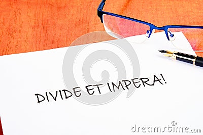 Latin quote Divide et impera meaning Divide and conquer. the best method of governing Stock Photo