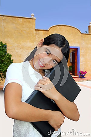 Latin teenager brunette student hug laptop Stock Photo