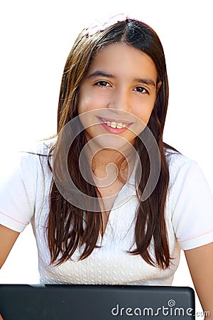 Latin teenager student smiling holding laptop Stock Photo