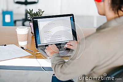 Latin woman working with computer at office in Mexico city Stock Photo